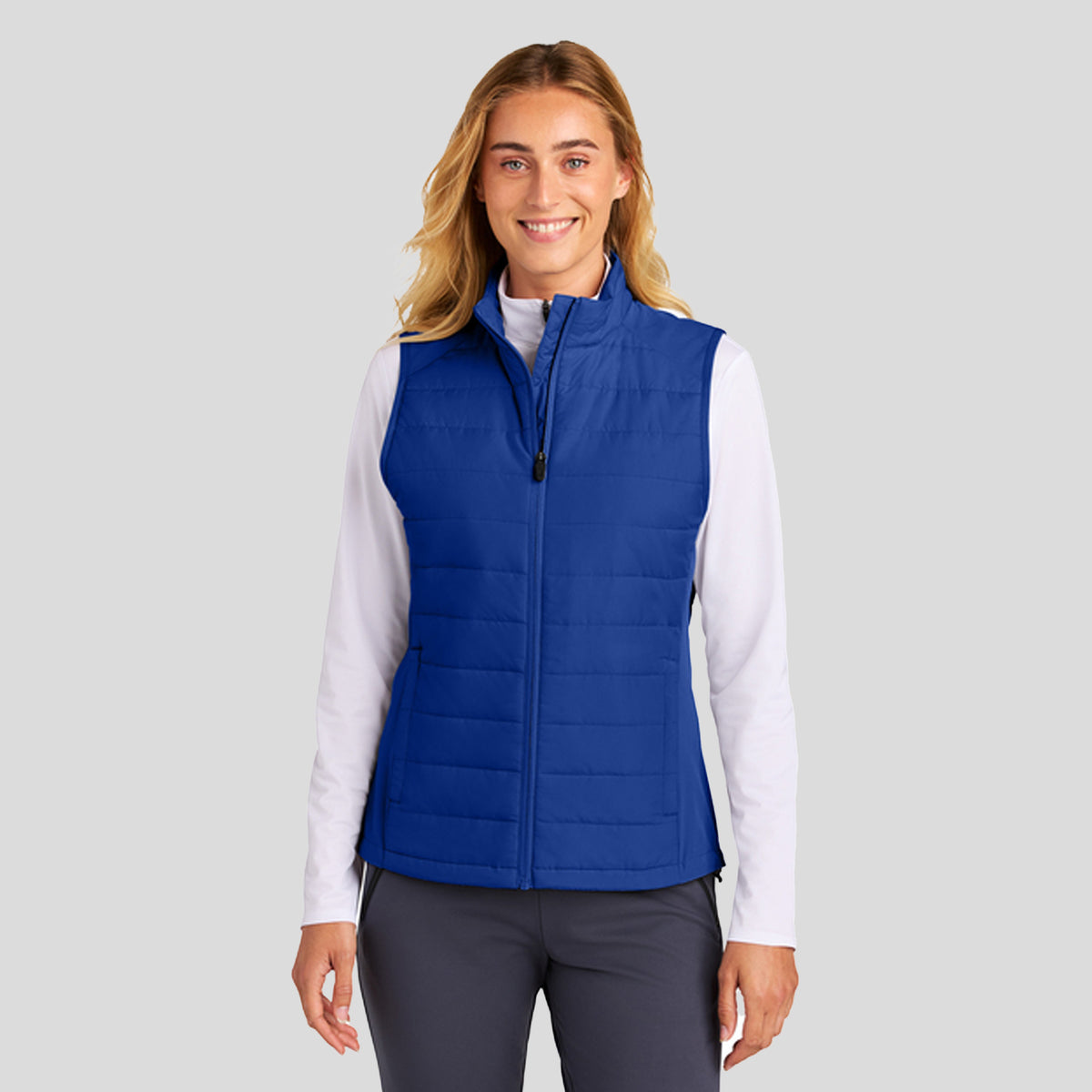 Womenโs Teknical Hybrid Vest | True Royal